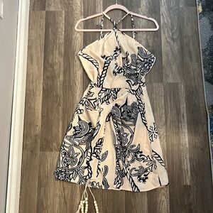 Brand new apricot colored dress with blue design